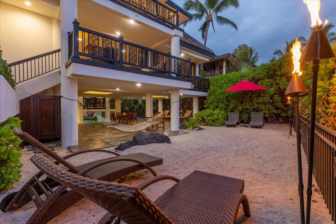 Private sandy beach access at Kona Bay Estates oceanfront home
