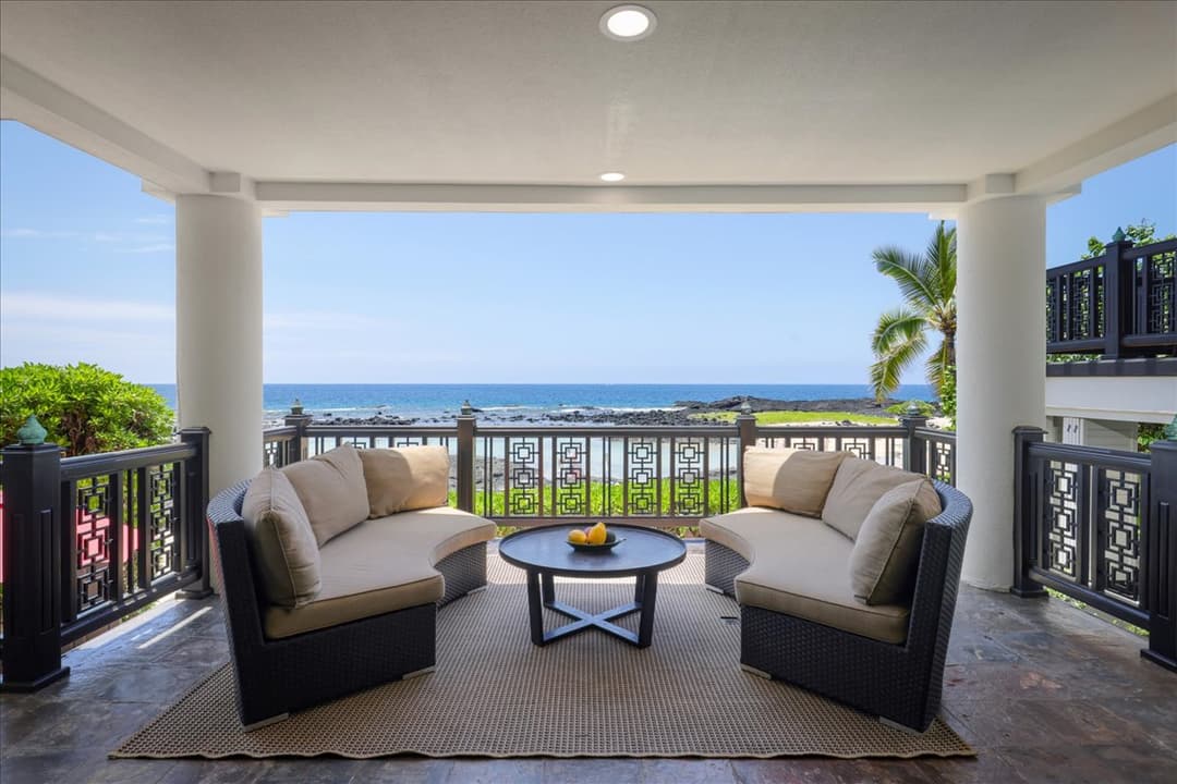Covered oceanfront lanai at Kona Bay Estates luxury residence