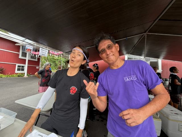Kai and Kumi at food booth