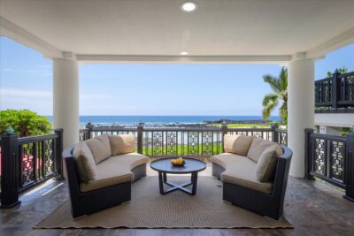 Covered oceanfront lanai at Kona Bay Estates luxury residence
